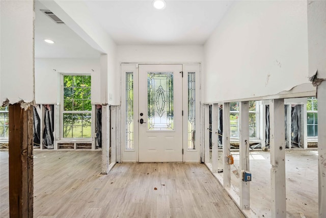 entrance foyer featuring light wood-type flooring, visible vents, and recessed lighting