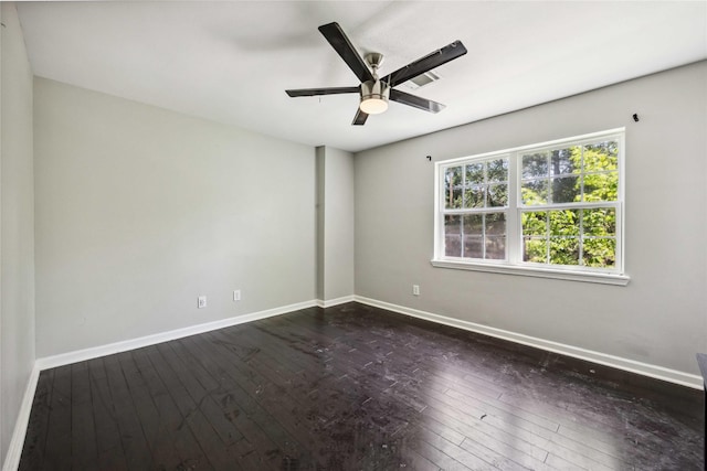 unfurnished room featuring ceiling fan, baseboards, and dark wood-style flooring