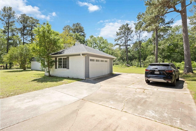 view of property exterior with a lawn, roof with shingles, concrete driveway, and a garage