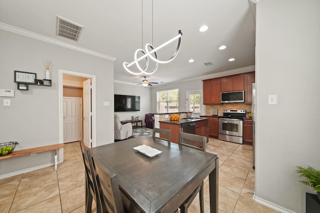 dining area with visible vents, crown molding, an inviting chandelier, recessed lighting, and light tile patterned floors