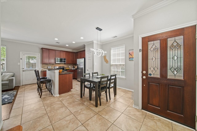 dining area featuring baseboards, ornamental molding, light tile patterned floors, and recessed lighting