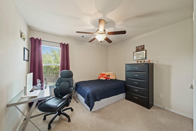 carpeted bedroom with ceiling fan, visible vents, and baseboards
