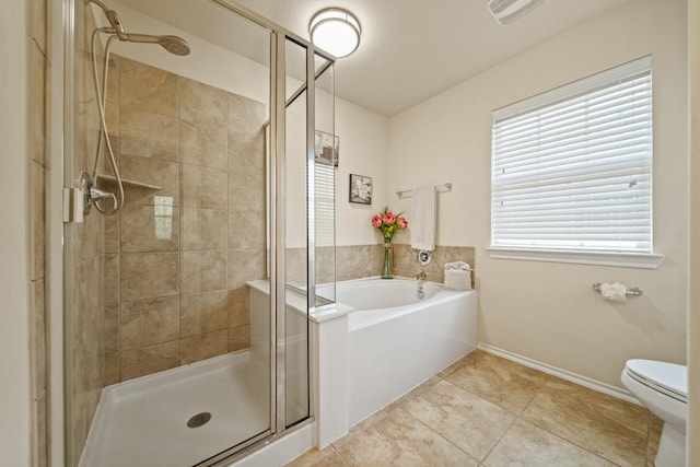 full bath with toilet, baseboards, a shower stall, visible vents, and a bath