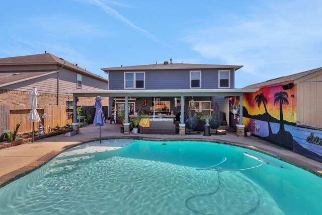 view of pool featuring an outdoor hangout area, a fenced in pool, a patio, and fence