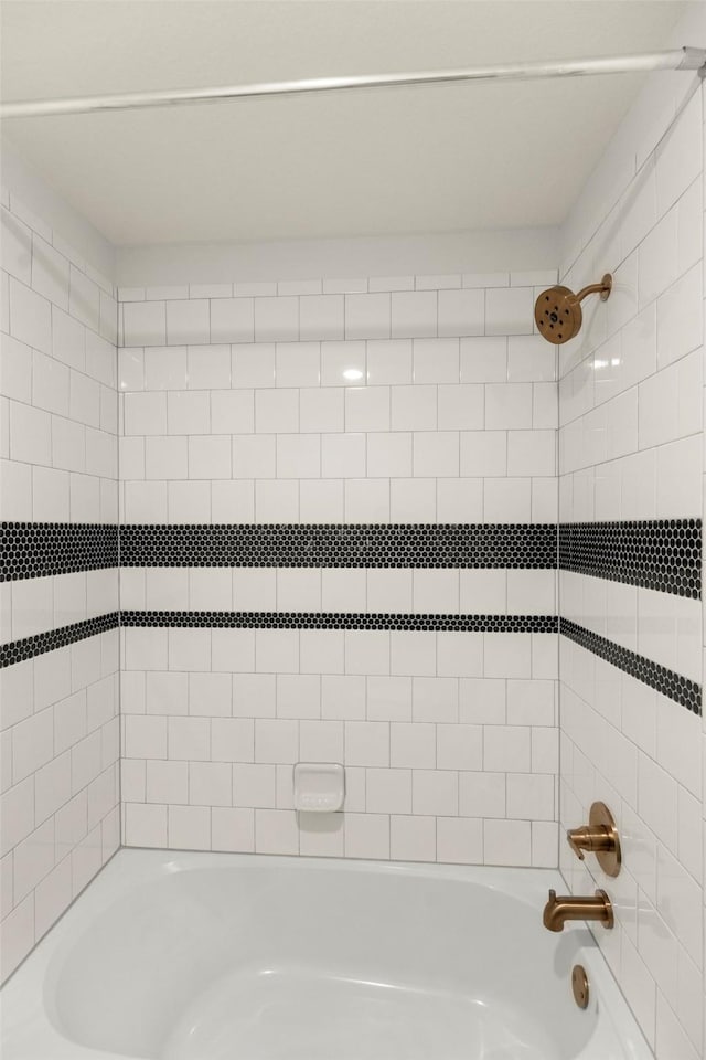 bathroom with shower / bathtub combination