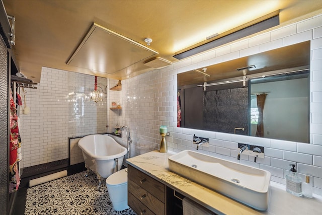 full bathroom featuring vanity, a soaking tub, tiled shower, and tile walls