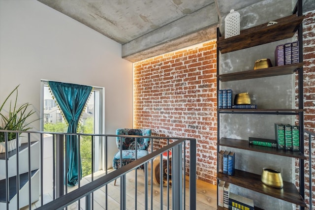 hall with brick wall