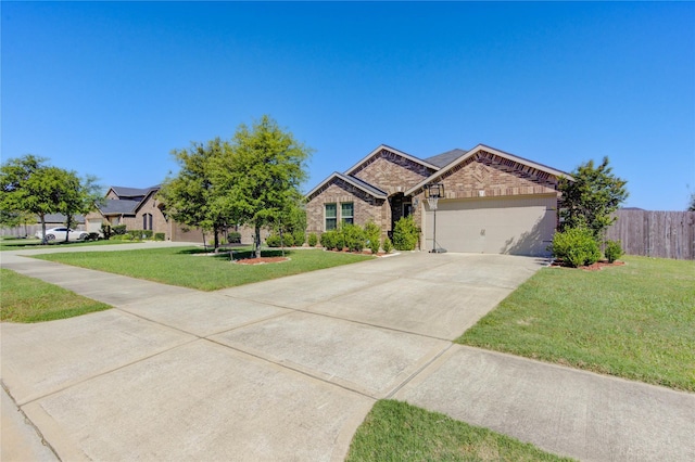 view of front of property featuring concrete driveway, an attached garage, a front lawn, brick siding, and fence