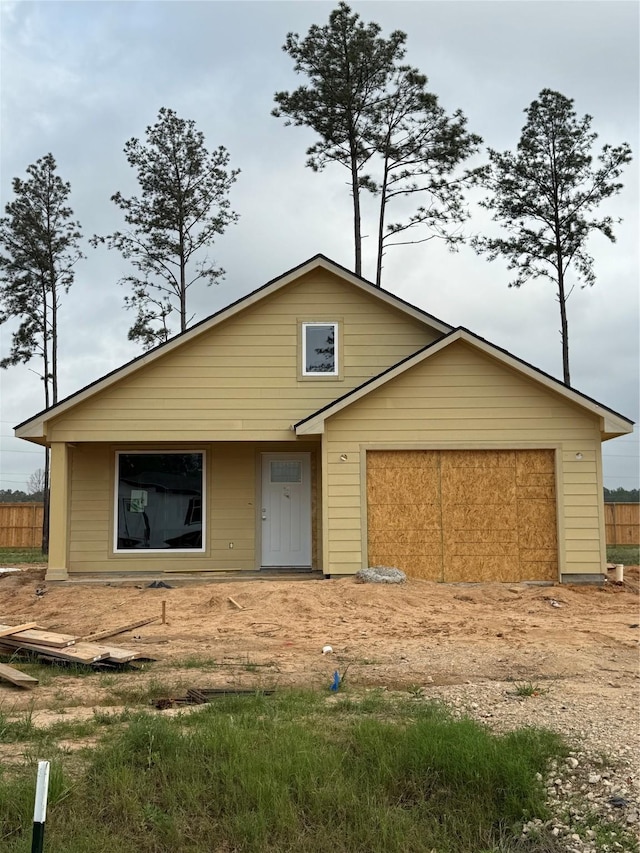 view of front of property featuring a garage