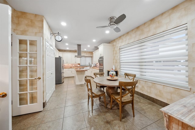 12538 W Pavilion Ct W, Tomball, TX 77377 - dining space with a ceiling fan, light tile patterned floors, and recessed lighting