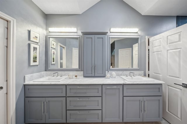 12538 W Pavilion Ct W, Tomball, TX 77377 - bathroom featuring double vanity and a textured wall