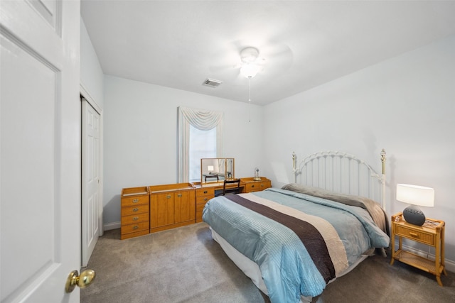 12538 W Pavilion Ct W, Tomball, TX 77377 - carpeted bedroom with a closet and baseboards