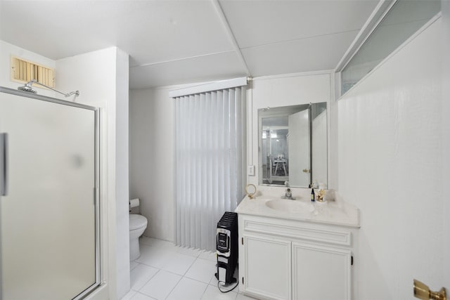 12538 W Pavilion Ct W, Tomball, TX 77377 - bathroom with toilet, vanity, a shower stall, and tile patterned flooring