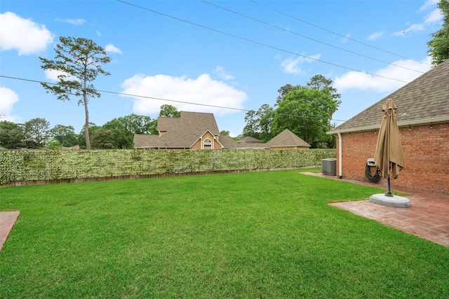 12538 W Pavilion Ct W, Tomball, TX 77377 - view of yard with a patio area and central AC unit