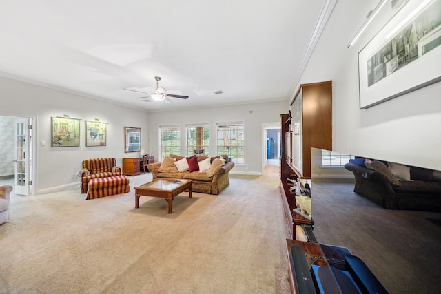 12538 W Pavilion Ct W, Tomball, TX 77377 - living area featuring light carpet, baseboards, ornamental molding, and a ceiling fan