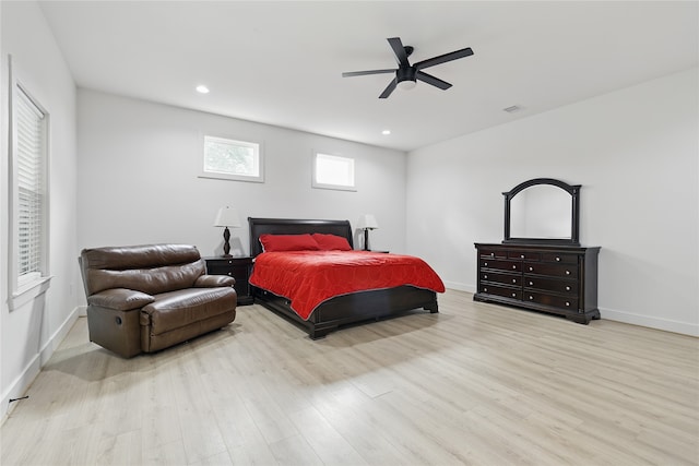 bedroom with wood finished floors, ceiling fan, baseboards, and recessed lighting