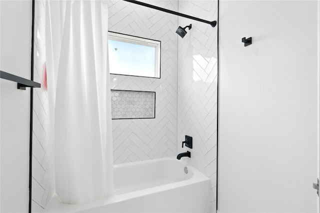 bathroom with shower / tub combo with curtain