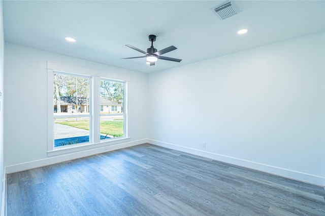 8006 17th Green Dr, Humble, TX 77346 - empty room featuring baseboards, recessed lighting, a ceiling fan, visible vents, and wood finished floors