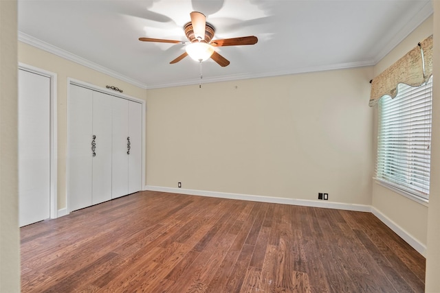 53 Litchfield Ln, Houston, TX 77024 - unfurnished bedroom with wood finished floors, ornamental molding, ceiling fan, and baseboards