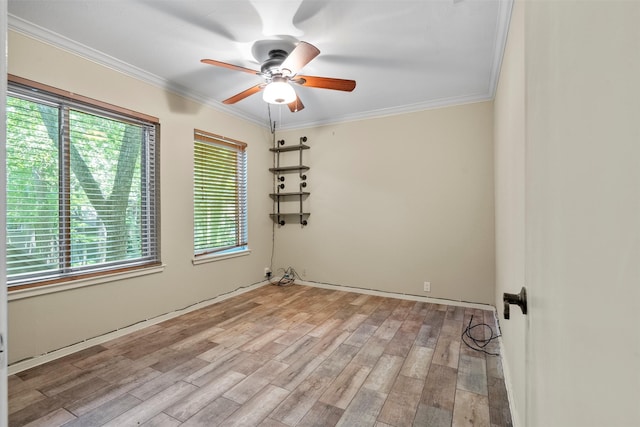 53 Litchfield Ln, Houston, TX 77024 - empty room with plenty of natural light, ceiling fan, crown molding, and wood finished floors