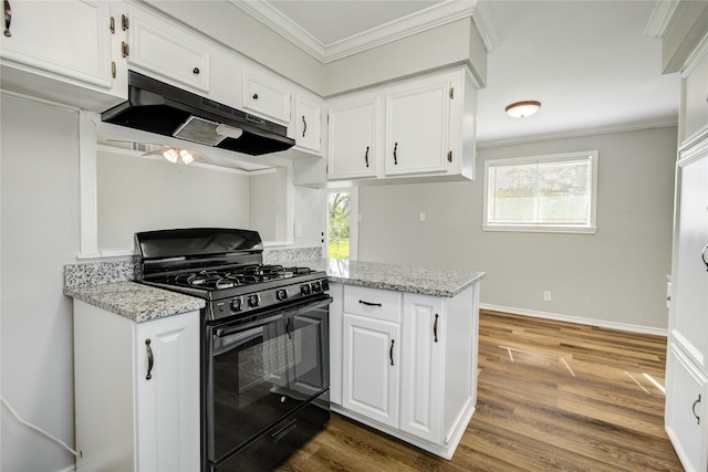 kitchen with white cabinets, black gas stove, under cabinet range hood, crown molding, and wood finished floors