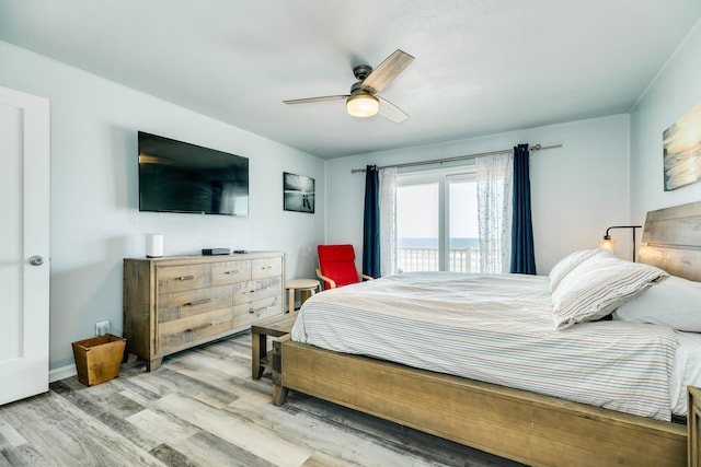 bedroom featuring light wood-style flooring and ceiling fan