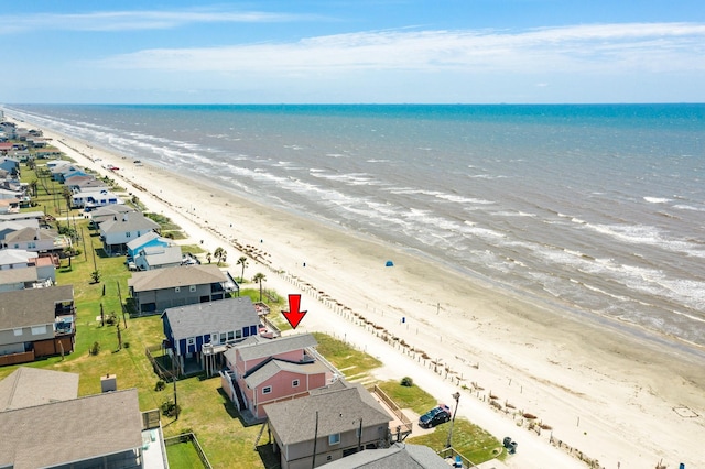 aerial view featuring a water view and a beach view