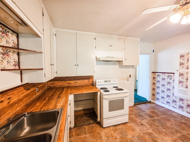 106 Jordan Ave, Cleveland, TX 77327 - kitchen featuring white cabinets, a sink, ceiling fan, wood counters, and electric range