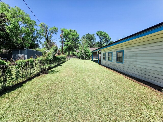 106 Jordan Ave, Cleveland, TX 77327 - view of yard featuring fence
