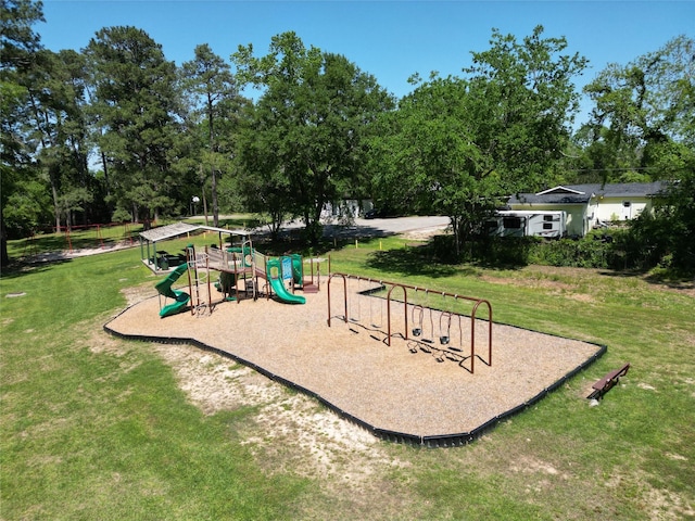106 Jordan Ave, Cleveland, TX 77327 - community playground featuring a lawn