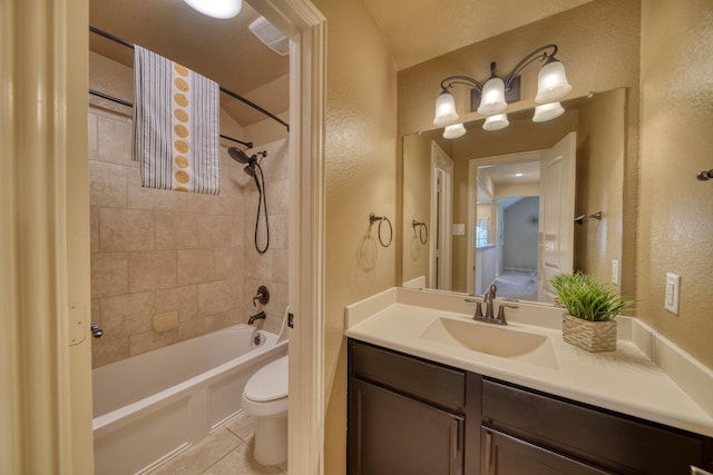 6303 Wood Creek Ln, League City, TX 77573 - bathroom with vanity, shower / tub combination, toilet, tile patterned floors, and a textured wall