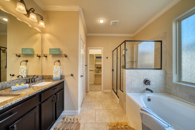 6303 Wood Creek Ln, League City, TX 77573 - full bath featuring visible vents, a sink, a spacious closet, a stall shower, and a garden tub