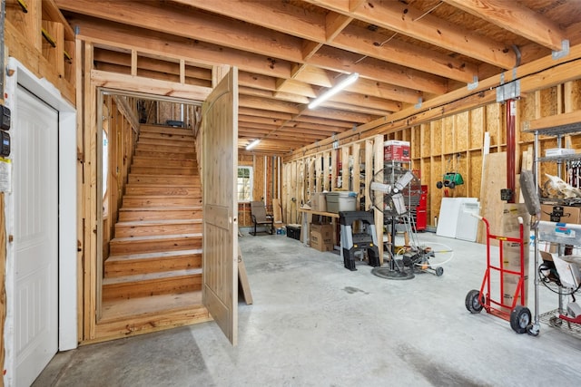 14832 Oak Shores Dr, Willis, TX 77318 - below grade area with stairs and washing machine and dryer