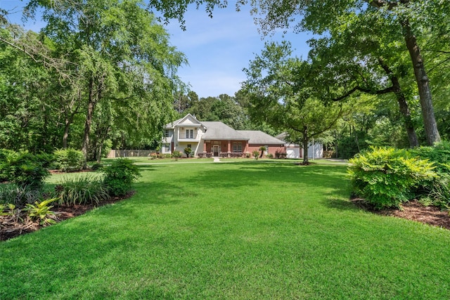 14832 Oak Shores Dr, Willis, TX 77318 - view of grassy yard
