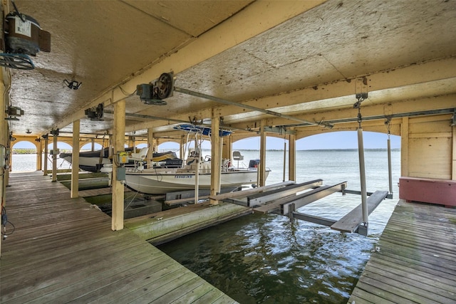14832 Oak Shores Dr, Willis, TX 77318 - dock area with boat lift and a water view
