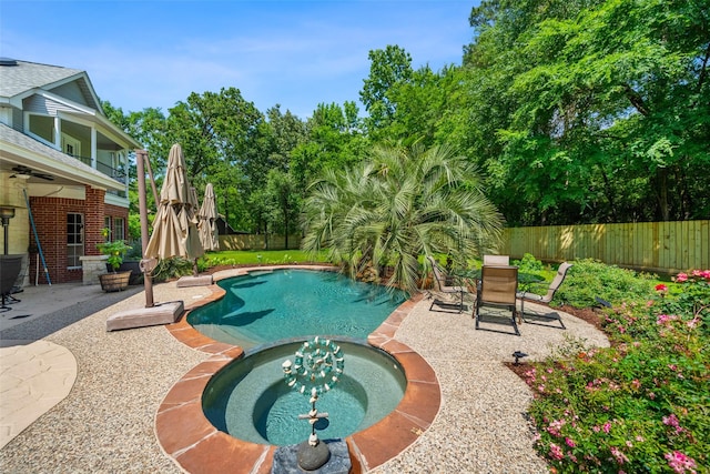 14832 Oak Shores Dr, Willis, TX 77318 - view of pool with ceiling fan, a patio, and a fenced backyard