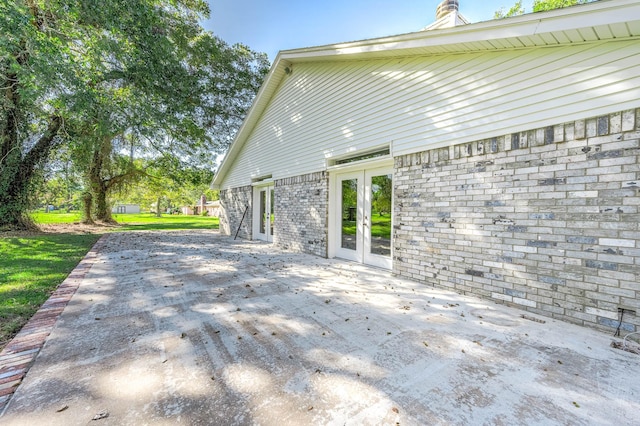 view of patio featuring french doors