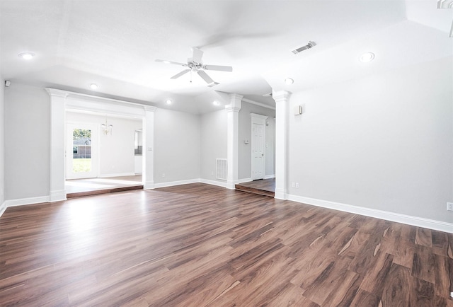 unfurnished living room with decorative columns, ceiling fan, visible vents, recessed lighting, and dark wood-style floors