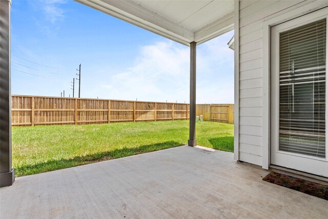 view of patio with a fenced backyard