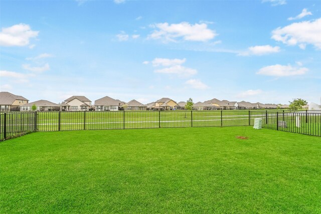 view of yard featuring a residential view