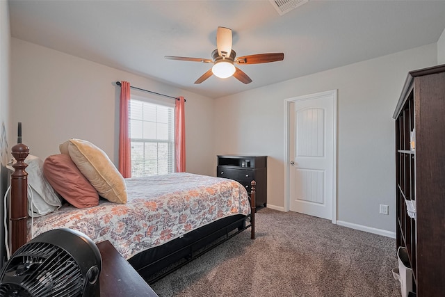 bedroom with ceiling fan, visible vents, baseboards, and carpet floors