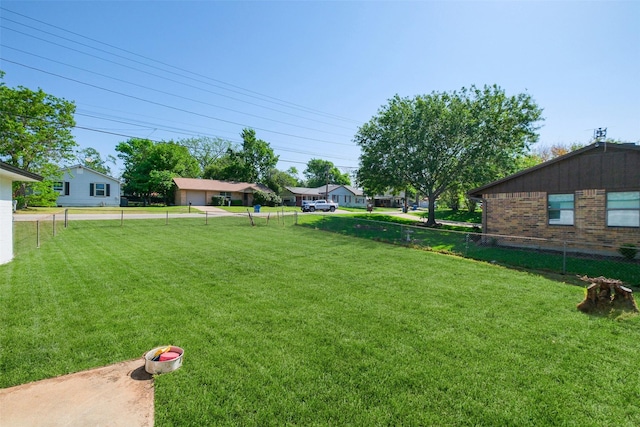 view of yard with fence