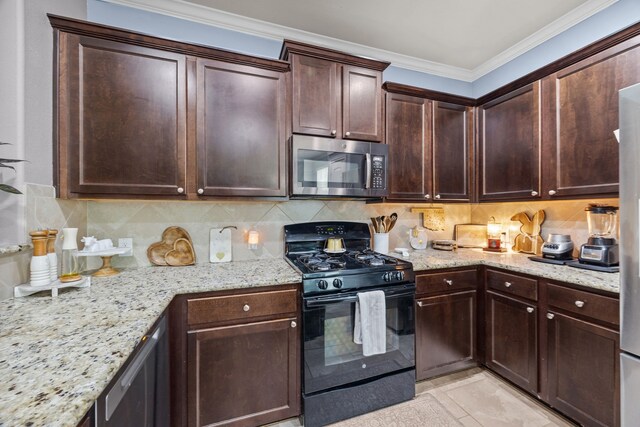 6857 Dogwood Cliff Ln, Dickinson, TX 77539 - kitchen featuring tasteful backsplash, ornamental molding, light stone counters, dark brown cabinets, and appliances with stainless steel finishes