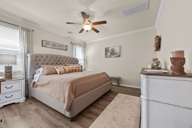 6857 Dogwood Cliff Ln, Dickinson, TX 77539 - bedroom with light wood finished floors, baseboards, ornamental molding, and visible vents