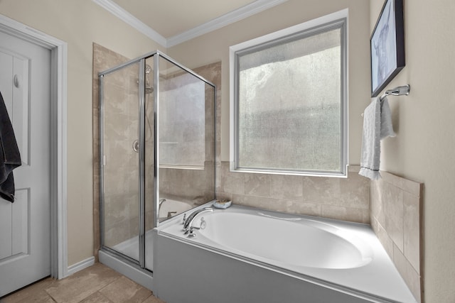6857 Dogwood Cliff Ln, Dickinson, TX 77539 - full bathroom featuring tile patterned floors, a garden tub, a stall shower, and crown molding