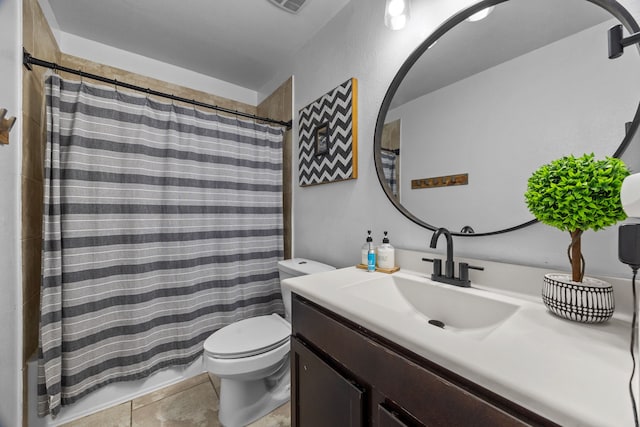 6857 Dogwood Cliff Ln, Dickinson, TX 77539 - bathroom with toilet, tile patterned floors, and vanity