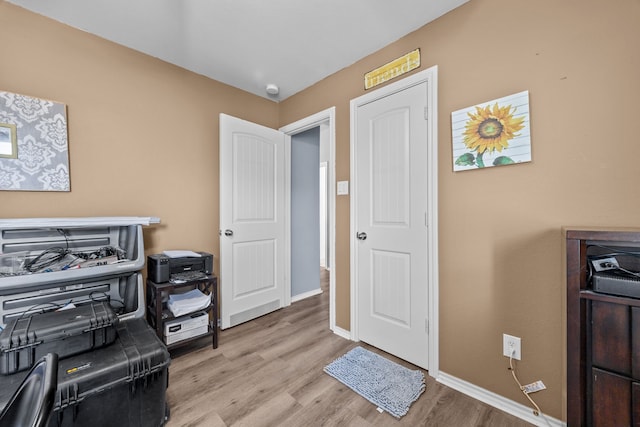 6857 Dogwood Cliff Ln, Dickinson, TX 77539 - office space with baseboards and wood finished floors