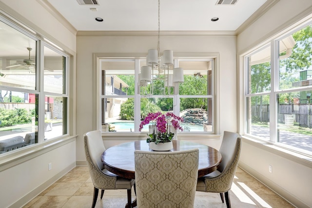 dining area with a chandelier, visible vents, and plenty of natural light