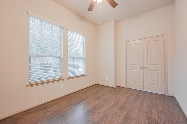 4410 Fenetre Forest St, Katy, TX 77493 - unfurnished room with baseboards, a ceiling fan, and wood finished floors