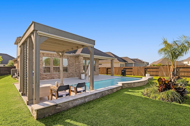 view of pool with a lawn, a fenced in pool, and a fenced backyard
